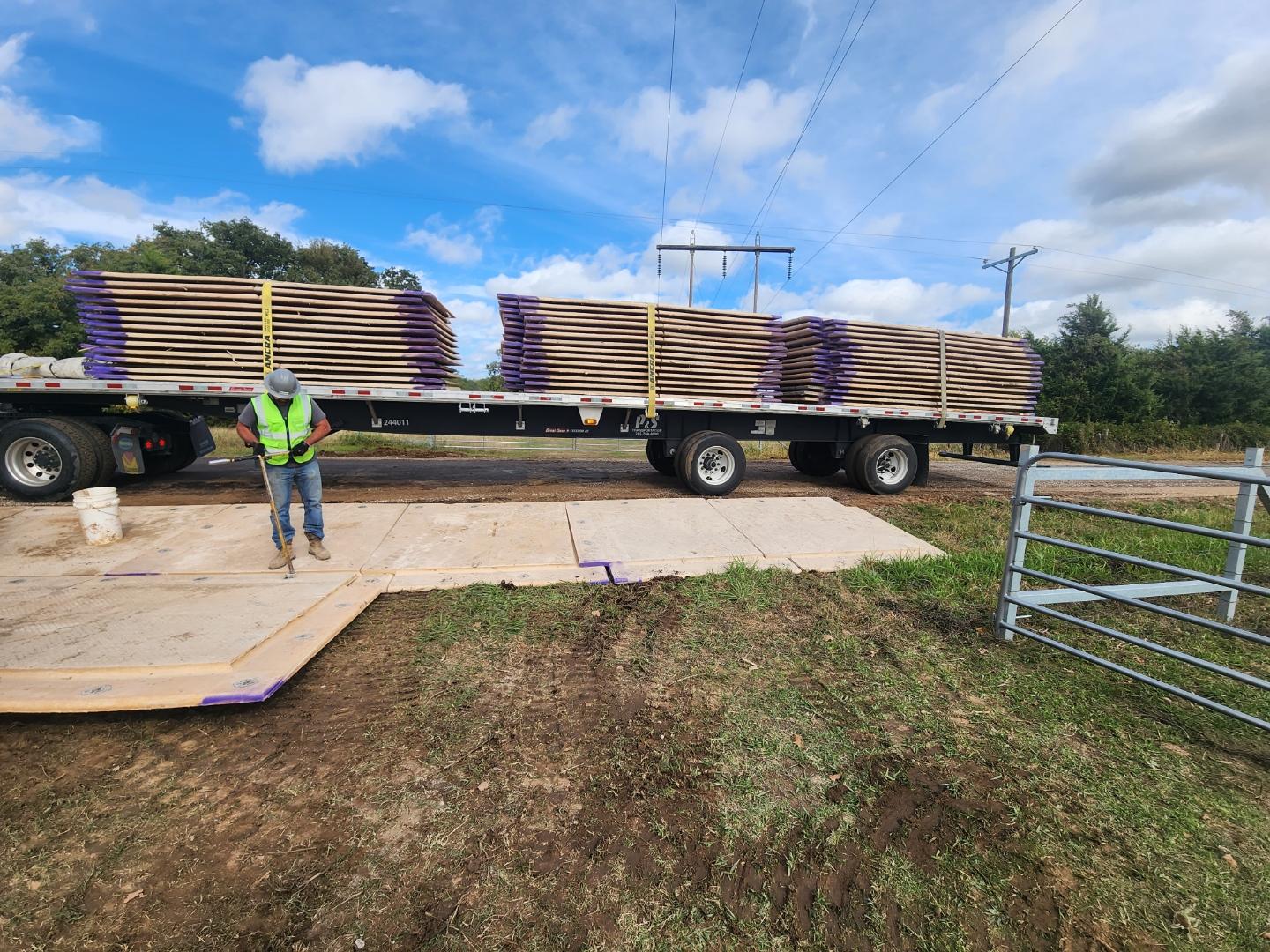 Composite access mats installed on a work site